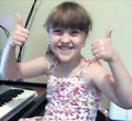 savannah at piano thumbs120